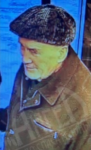 Коршунов Валерий Семёнович Одет как на фото.